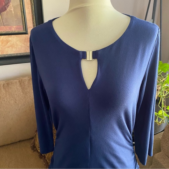 Vince Camuto Buckle Closure
Keyhole Top - Medium - Picture 2 of 9